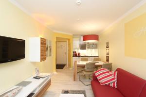 Køkken eller tekøkken på strandnah, Ferienwohnung mit Sauna- und Schwimmbadnutzung - Strandresidenz Baabe FeWo1-29