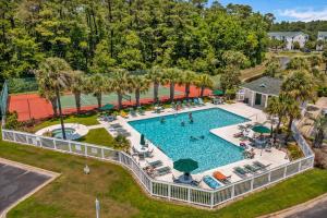 an overhead view of a pool at a resort at Sunset Paradise in Sunset Beach