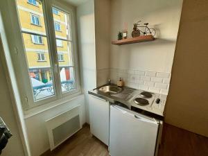 Η κουζίνα ή μικρή κουζίνα στο Appartement chaleureux