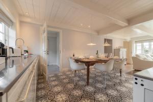 Kuchyň nebo kuchyňský kout v ubytování Kapitänshaus Ost + 25 fotografií