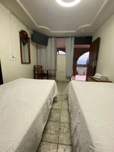 Postel nebo postele na pokoji v ubytování HOTEL FLAMINGOS DE CIUDAD GUZMAN