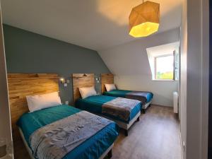 Fotografia z galérie ubytovania Gîte rénové 2022, 20 pers., 8 chambres, PMR, équipements sportifs, parking privé, proche Châtre - FR-1-591-363 v destinácii Le Magny