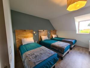Fotografia z galérie ubytovania Gîte rénové 2022, 20 pers., 8 chambres, PMR, équipements sportifs, parking privé, proche Châtre - FR-1-591-363 v destinácii Le Magny