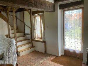 Posteľ alebo postele v izbe v ubytovaní Gîte charmant en Berry avec terrasse, jardin, parking et chauffage inclus - FR-1-591-364
