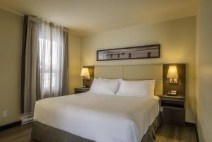 Letto o letti in una camera di Rodd Miramichi