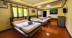 Postel nebo postele na pokoji v ubytování Bakasyunan Resort and Conference Center - Zambales + 37 fotografií