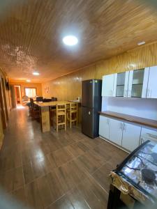 Kuchyň nebo kuchyňský kout v ubytování Hostal Coronel Riffo + 6 fotografií
