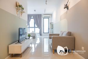 Highpark Suites at Petaling Jaya, Kelana Jaya by Plush的电视和/或娱乐中心