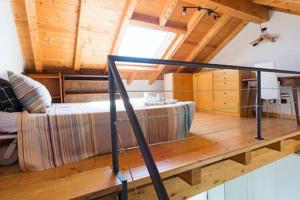 a living room with a couch and a glass floor at Villa Arona in Arona