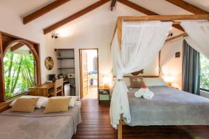 Ένα ή περισσότερα κρεβάτια σε δωμάτιο στο Villas Almendros