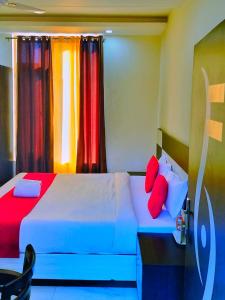 A bed or beds in a room at Neo Himalyan stays