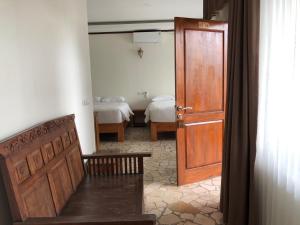 Ένα ή περισσότερα κρεβάτια σε δωμάτιο στο Edge Resort, Yogyakarta