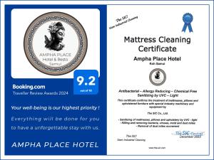 ein Flyer für ein Antiochica Place Hotel mit einer Medaille in der Unterkunft Ampha Place Hotel in Mae Nam