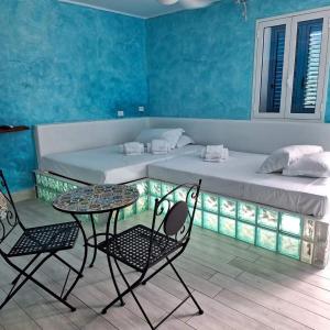 Posezení v ubytování Suite House L'Isola Che Non C'è