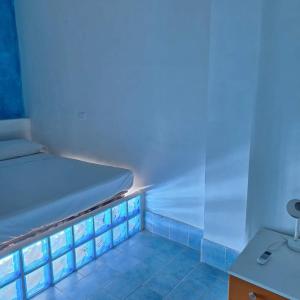 Letto o letti in una camera di Suite House L'Isola Che Non C'è