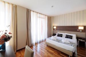 Posteľ alebo postele v izbe v ubytovaní Charme Hotel