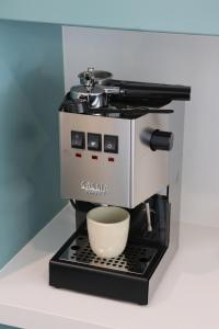 a coffee maker with a bowl on top of it at Gladbyrne in Braidwood