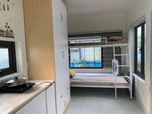 TV a/nebo společenská místnost v ubytování Bình An Homestay