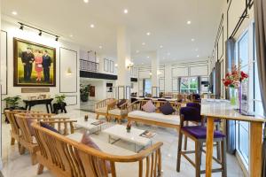 Posezení v ubytování Villa De Pranakorn