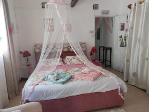 Postel nebo postele na pokoji v ubytování Chambre D'hote PLACE DES AMOUREUX