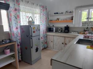 Kuchyň nebo kuchyňský kout v ubytování Chambre D'hote PLACE DES AMOUREUX