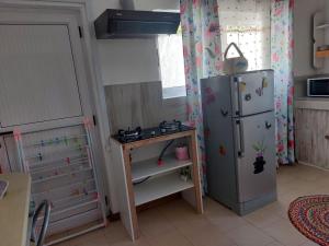 Kuchyň nebo kuchyňský kout v ubytování Chambre D'hote PLACE DES AMOUREUX
