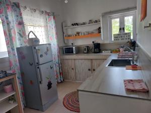 Kuchyň nebo kuchyňský kout v ubytování Chambre D'hote PLACE DES AMOUREUX