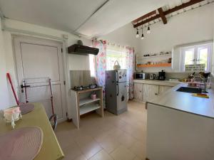Kuchyň nebo kuchyňský kout v ubytování Chambre D'hote PLACE DES AMOUREUX