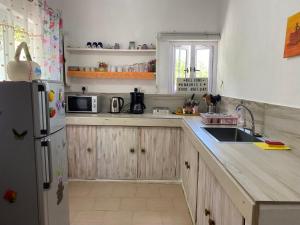 Kuchyň nebo kuchyňský kout v ubytování Chambre D'hote PLACE DES AMOUREUX