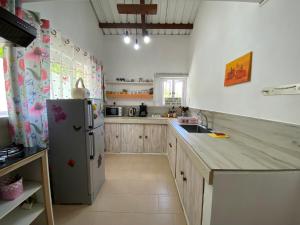 Kuchyň nebo kuchyňský kout v ubytování Chambre D'hote PLACE DES AMOUREUX