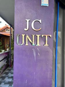 a sign that says ic unit on the side of a building at JC Unit #8 in Urdaneta