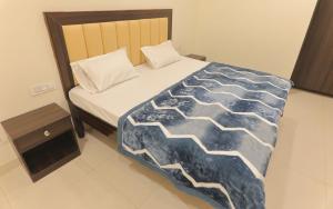 Postel nebo postele na pokoji v ubytování Hotel Nova Inn by StayApart