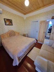 Voodi või voodid majutusasutuse Guest House Balda toas