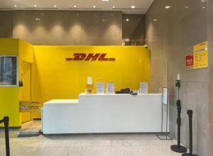 a yellow and white counter in a building at LOTTE City Hotel Guro in Seoul