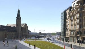 盧森堡的住宿－The Residence Gare，街道中间有钟楼的一个城市