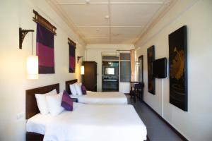 Postel nebo postele na pokoji v ubytování Eco Resort Chiang Mai