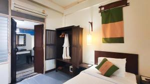 Postel nebo postele na pokoji v ubytování Eco Resort Chiang Mai