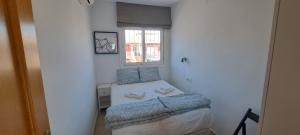Ένα ή περισσότερα κρεβάτια σε δωμάτιο στο Mazarron Beach apartment