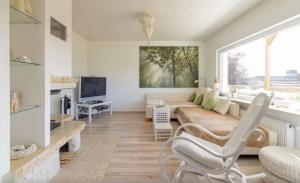 Μια τηλεόραση ή/και κέντρο ψυχαγωγίας στο Maintal Apartment 1