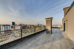 a balcony with a view of a city at Mona Living in Sofia