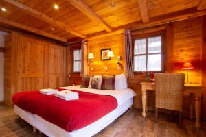 Chalet Panoramique by Chalet Chardonsにあるベッド