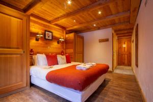 Chalet Panoramique by Chalet Chardonsにあるベッド