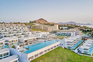 een luchtzicht op een resort met een zwembad bij Lindos Grand Resort & Spa - Adults Only in Lindos