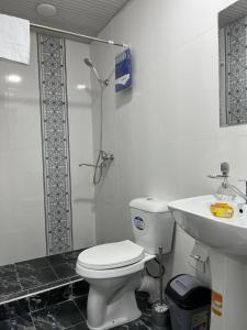 Ein Badezimmer in der Unterkunft Iyman Hotel