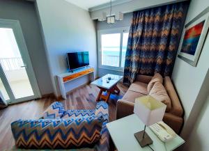 TV a/nebo společenská místnost v ubytování Beau Site Hotel