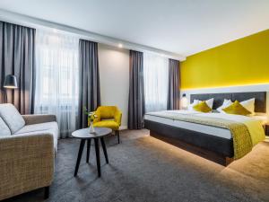 מיטה או מיטות בחדר ב-Hotel Royal