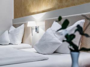 מיטה או מיטות בחדר ב-Hotel Royal