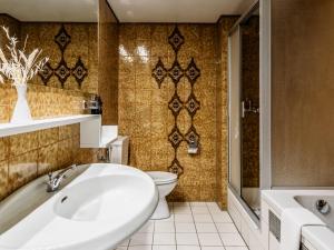 חדר רחצה ב-Hotel Royal