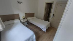 Postel nebo postele na pokoji v ubytování Hostal Rural Sositana