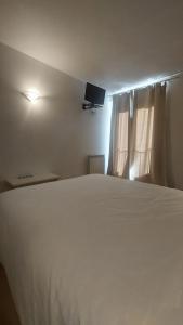 Postel nebo postele na pokoji v ubytování Hostal Rural Sositana